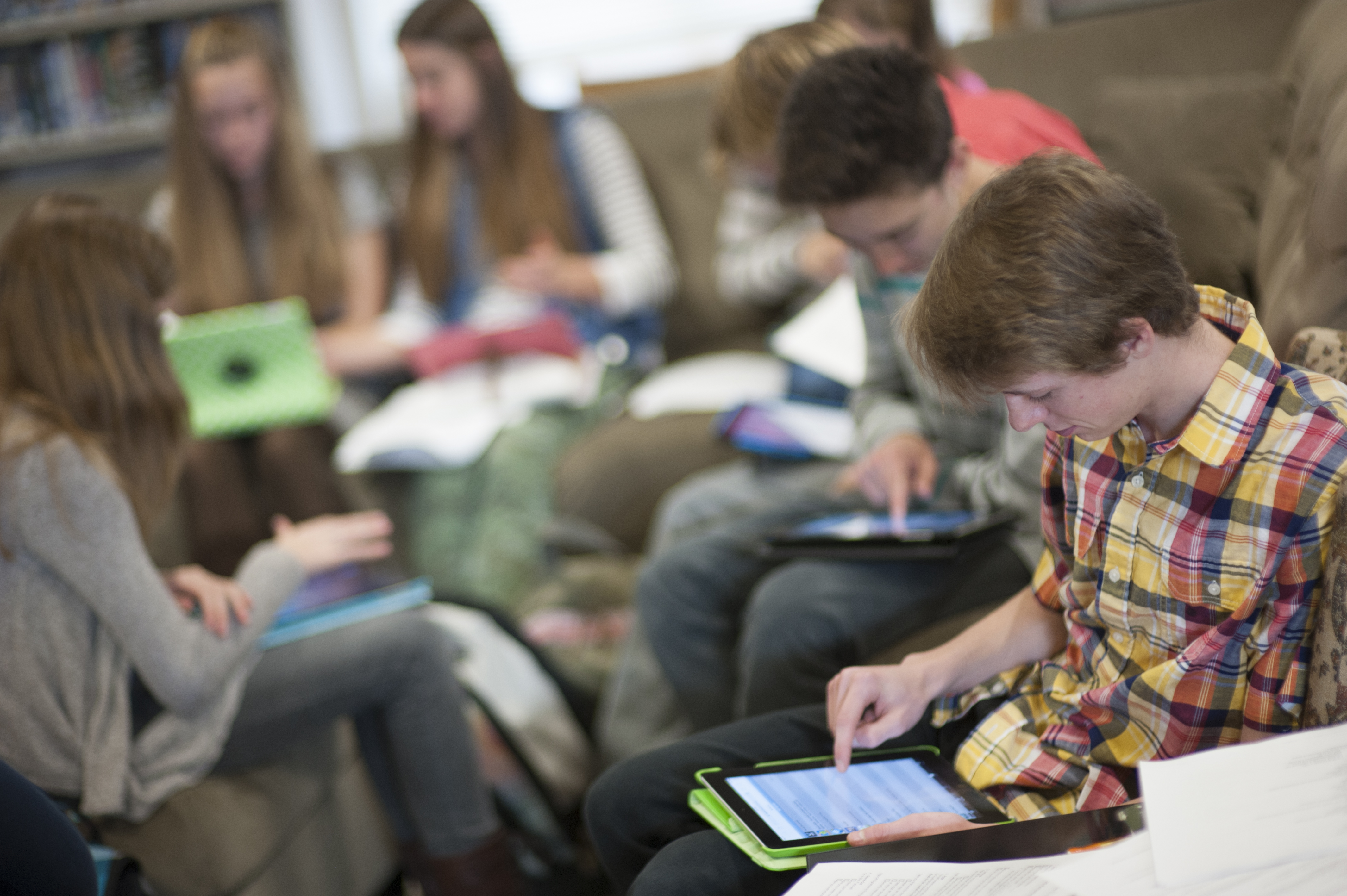 High school students using ipads