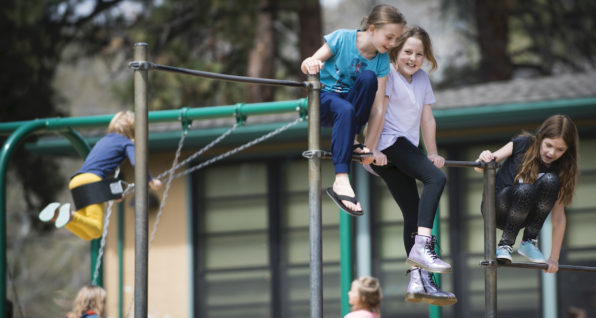 Students on Playground Equipment