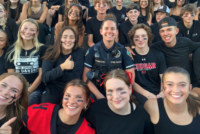 School Resource Officer at sporting event with students