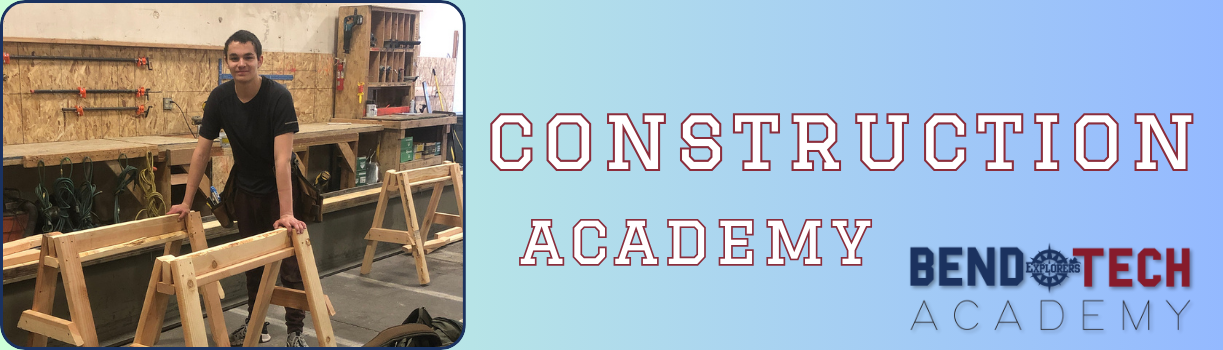 Banner reading Construction Academy and image of male student standing by wooden door frames being made