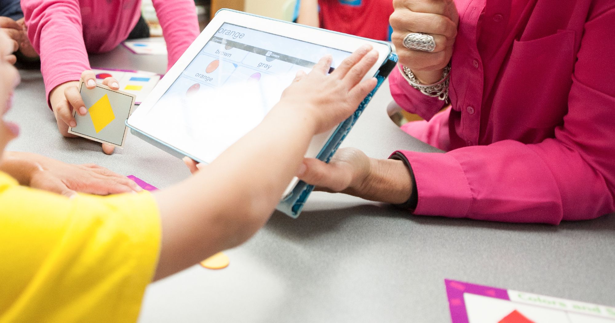 Students use iPads in classrooms